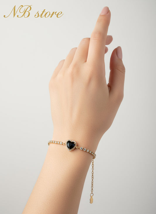 bellissimi bracciali color oro con brillantini con cuore al centro