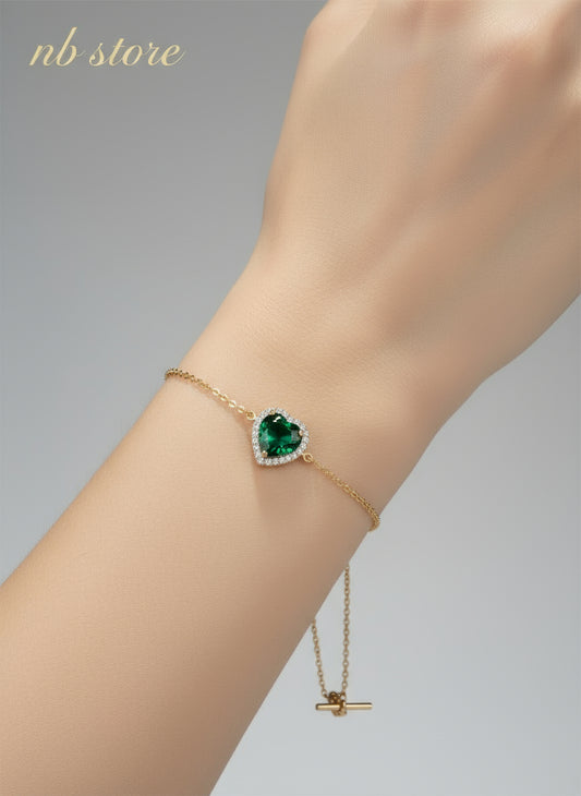 bellissimi bracciali color oro con brillantini con cuore al centro
