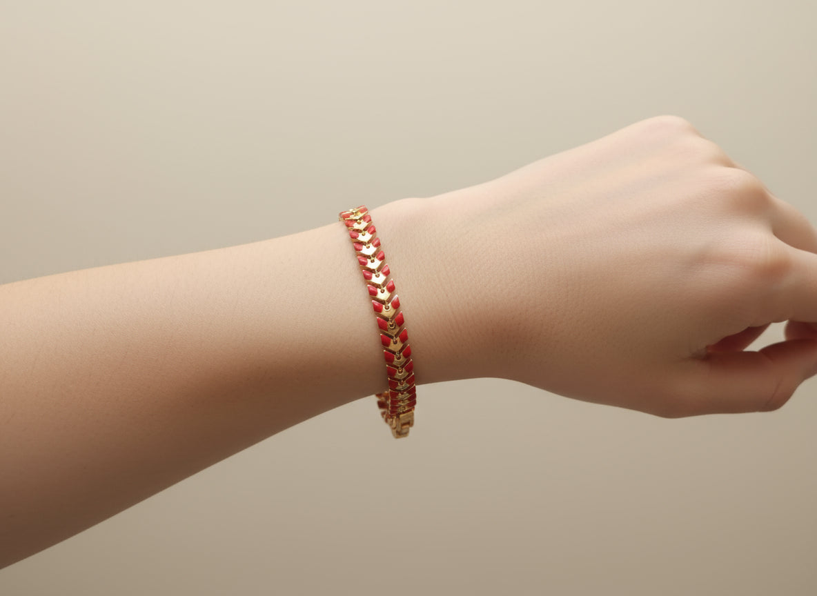 bracciale dorato con foglie rosse- blu