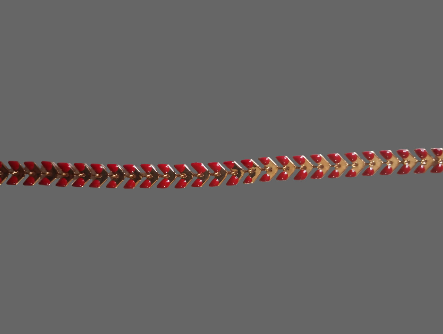 bracciale dorato con foglie rosse- blu