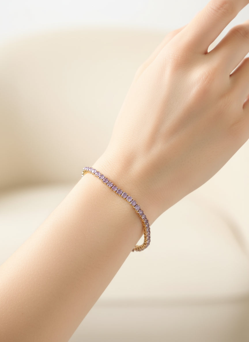 bracciale dorato con pietre viola